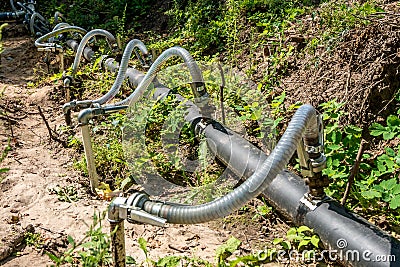 Pumping station. groundwater drainage system pumps water out of the ground. dehydration gravel rural route Stock Photo