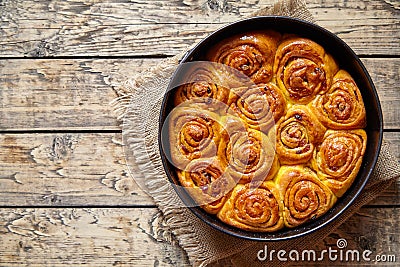 Pumpkin cinnamon bun rolls homemade sweet fall dessert bread food Stock Photo