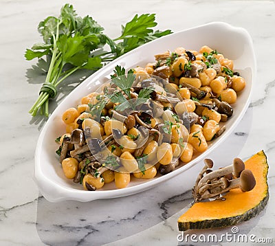 Pumpkin gnocchi with mushroom Stock Photo