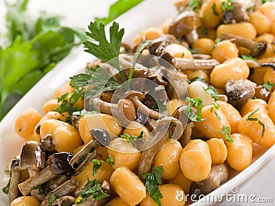 Pumpkin gnocchi with mushroom Stock Photo