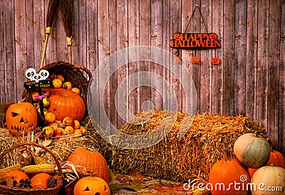 Pumpkin heads and autumn props on wooden background Stock Photo