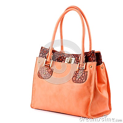 Pumpkin leather female handbag isolated on white background Stock Photo