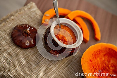 Pumpkin milk soup in a pot, close-up Stock Photo