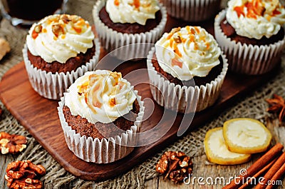 Pumpkin pie spices walnuts banana cupcakes with salted caramel a Stock Photo