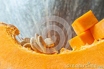 Pumpkin piece with seeds. Fresh and ripe pumpkin detail vegetable Stock Photo