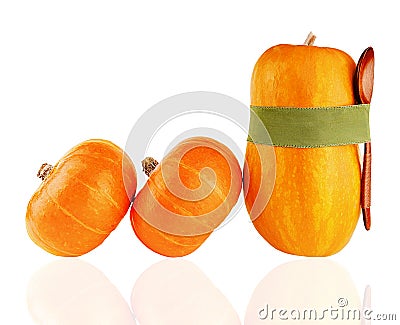 Pumpkin with riibbon isolated on white with reflection Stock Photo