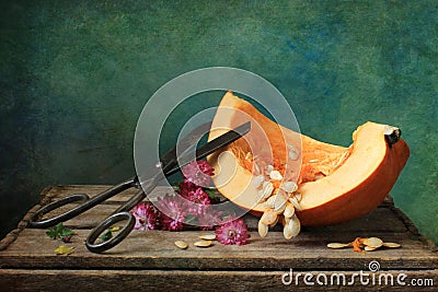 Pumpkin with scissors Stock Photo