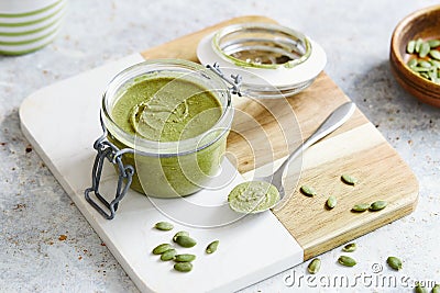 Jar of pumpkin seed butter Stock Photo