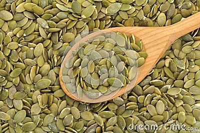 Pumpkin seeds with spoon Stock Photo