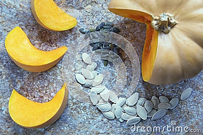 Pumpkin and pumpkin slices and seeds - in shell and peeled Stock Photo