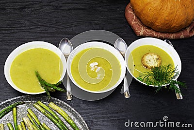 Pumpkin soup with shrimp, asparagus Stock Photo