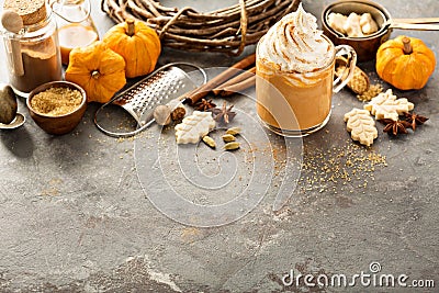 Pumpkin spice latte in a glass mug Stock Photo