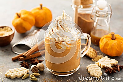 Pumpkin spice latte in a glass mug Stock Photo