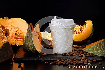 Coffee bean pumpkin spice latte nutrition recipie mock up. cut pumpkin coffee beans and white paper cup for coffee break Stock Photo