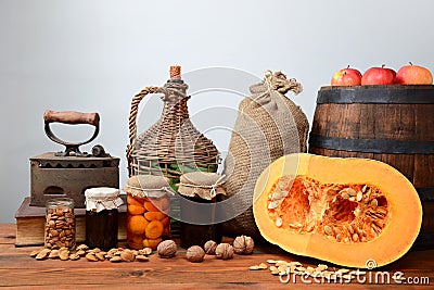 Pumpkin, walnuts, apples, and jam into jars Stock Photo