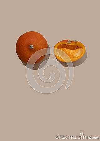 Pumpkin whole and half. Symbol and allegory of breast cancer and mastectomy. Concept surgery treatment. Stock Photo