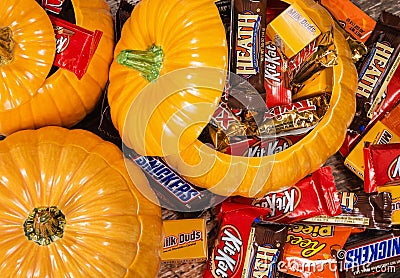 Pumpkins filled with Halloween candy Editorial Stock Photo