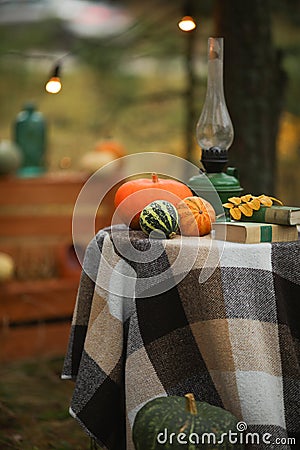 Pumpkins on the table against the background of boxes Stock Photo