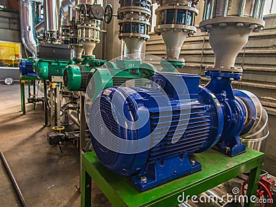 Pumps, valves and piping hot and cold water Stock Photo