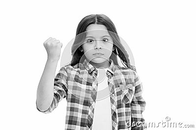 Punch you in your face. Stop bullying movement. Girl threatening with fist. Threatening physical attack. Kids aggression Stock Photo