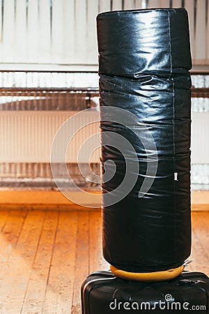 Punching bag for boxing at gym interior Stock Photo