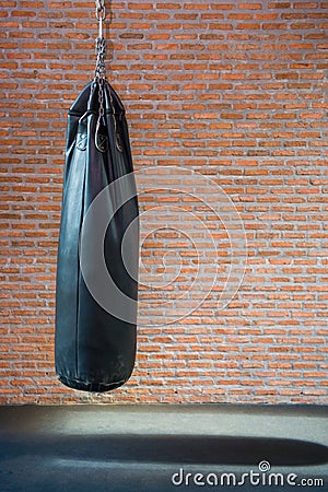 Punching bags in boxing room Stock Photo