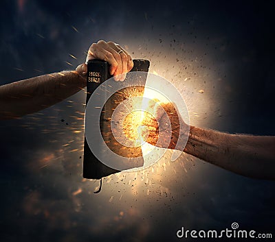 Punching the Bible Editorial Stock Photo