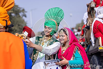 Punjabi male artist performing bhangra dance Editorial Stock Photo