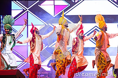 Punjabi sikh male performing bhangra dance at bikaner camel festival Editorial Stock Photo