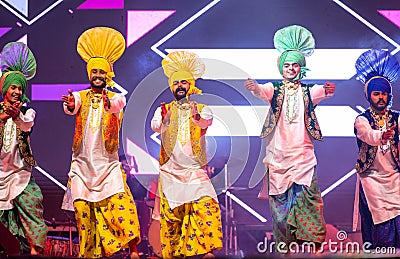 Punjabi sikh male performing bhangra dance at bikaner camel festival Editorial Stock Photo