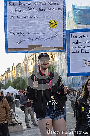 Punk girl on the demonstration on Prague Wenceslas square against the current government Editorial Stock Photo