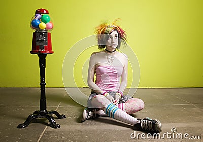 Punk Girl in front of a Green Wall Stock Photo