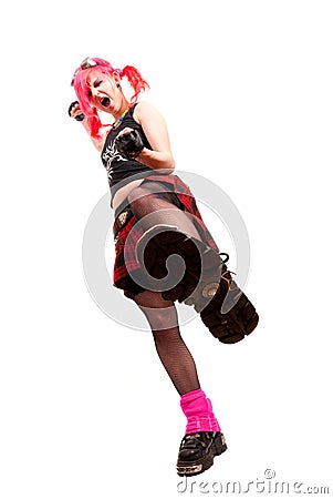 Punk girl wants to trample you. Stock Photo