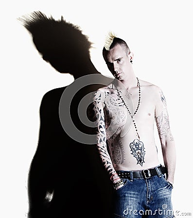 Punk with tattoos Stock Photo