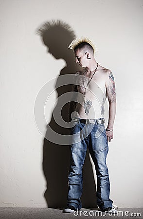 Punk with tattoos Stock Photo