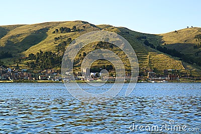Puno Town on the Shore of Lake Titicaca View from Cruise Ship, Puno, Peru Stock Photo