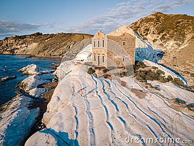Punta Bianca, Agrigento in Sicily Italy White beach with old ruins of abandoned stone house on white cliffs Stock Photo