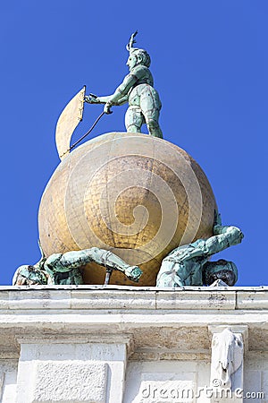 Punta della Dogana, top of the tower, golden globe with statue Fortune, Venice, Italy Editorial Stock Photo