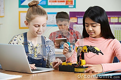 Pupils In Science Lesson Studying Robotics Stock Photo