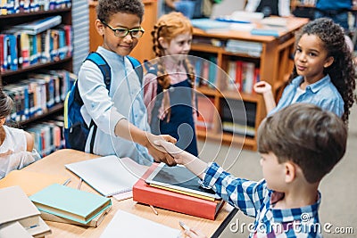 pupils shaking hands Stock Photo