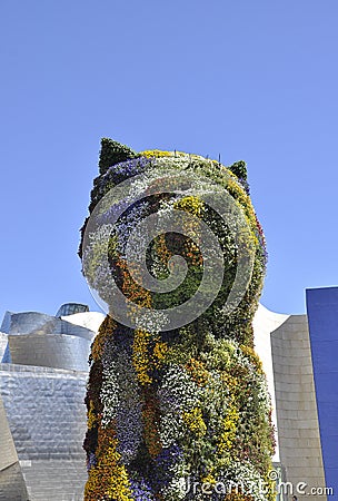 Puppy Floral Sculpture details front of Guggenheim Museum building from Bilbao city in Basque Country of Spain Editorial Stock Photo