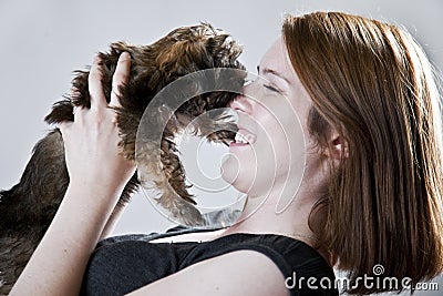 Puppy kisses Stock Photo