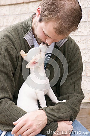 Puppy kisses Stock Photo