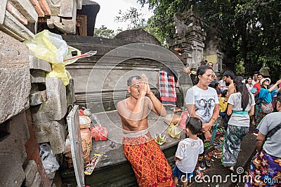 PURA TIRTA EMPUL, BALI, INDONESIA - AUGUST 17, 2016 - Balinese people at the temple for full moon celebration Editorial Stock Photo