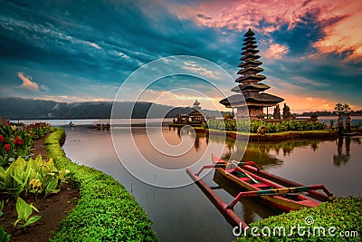 Pura Ulun Danu Bratan, Hindu temple with boat on Bratan lake landscape at sunrise in Bali, Indonesia Stock Photo