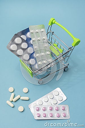 Purchase and delivery of medicines to your home. Online medicine, Cure for colds and epidemics. Various pills and medicines in Stock Photo