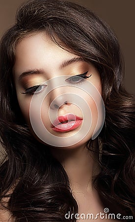 Pure Beauty. Portrait of Young Brunette with Glossy Makeup Stock Photo