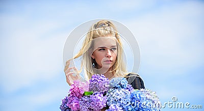 Pure beauty. Tenderness of young skin. Springtime bloom. Beauty of spring season. Girl tender blonde hold hydrangea Stock Photo