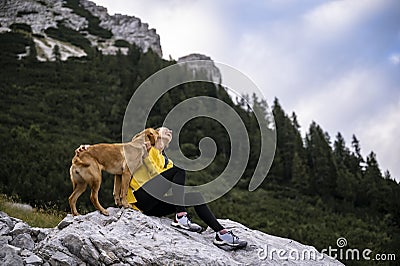 Pure and trustful relationship between a dog and a woman Stock Photo