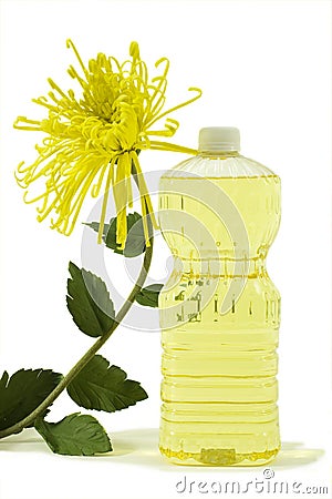 Pure Vegetable Oil With Flower Stock Photo